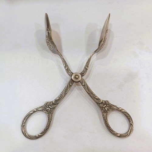 Sugar tongs used, Rococo Revival style, mid-20th century