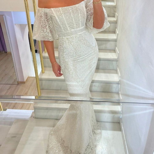 White dress with glitter details by S.Deligianni