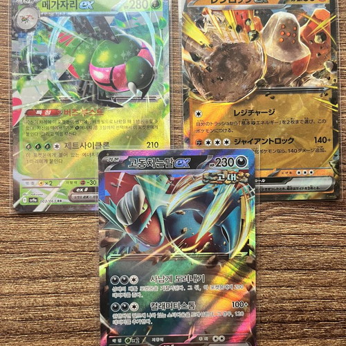 Pokémon cards Regirock Ex, Roaring Moon Ex, Yanmega Ex pack new
