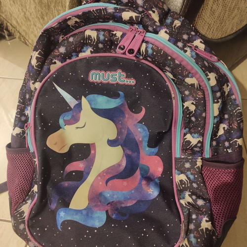 Unicorn school backpack, glows in the dark