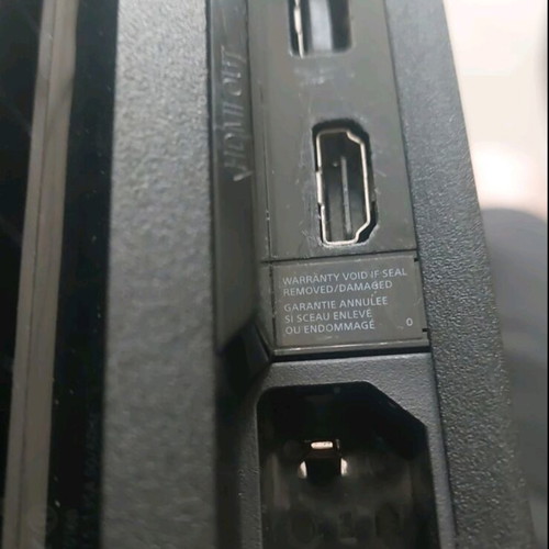 PlayStation 4 Pro 1TB console used with controller and FIFA 21 game