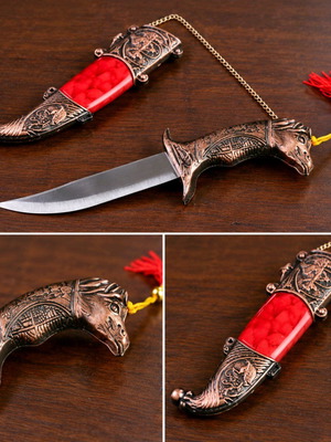 Collectible decorative knife with eagle design and case, like new