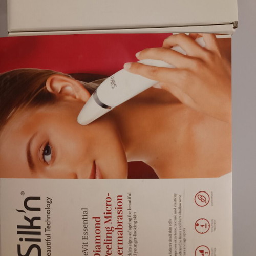 Diamond peeling microdermabrasion device like new with replacement pads