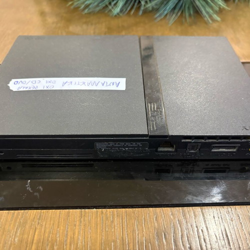PlayStation 2 slim μεταχειρισμένο για ανταλλακτικά με πρόβλημα στην τροφοδοσία και το cd drive