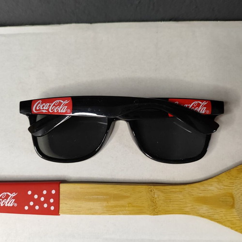 Coca Cola promotional set used with bag, kitchen tools, sunglasses, ball