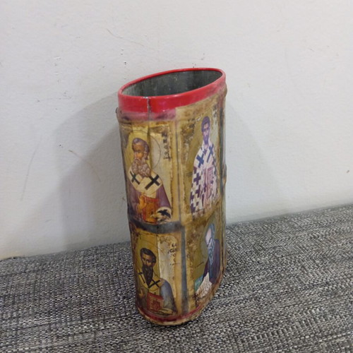 Vintage metal pencil holder decorated with icons used