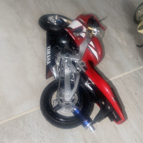 Collectible motorcycle toys used, Yamaha with broken parts