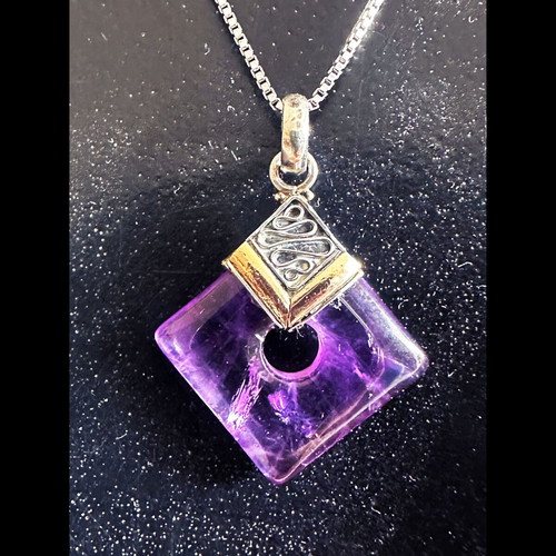 Vintage pendant with amethyst in 925 silver and gold