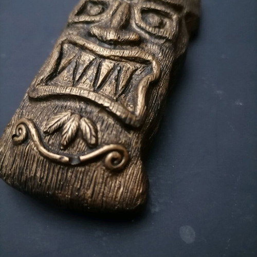 Handmade gypsum magnets and hanging totems painted with acrylics