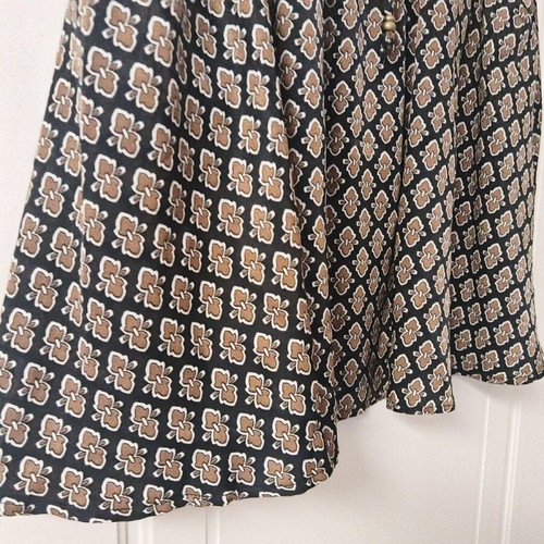 Louche skirt with elastic waist like new, size L, black and brown
