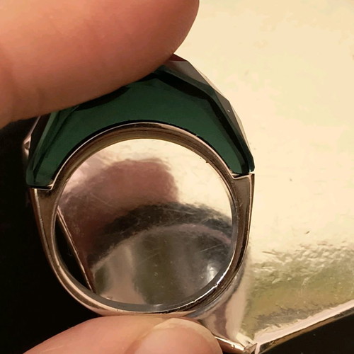 Steel ring used with green glass
