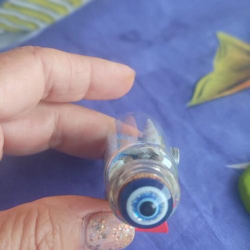 Souvenir from Santorini glass bottle with shells, sand and evil eye magnet like new