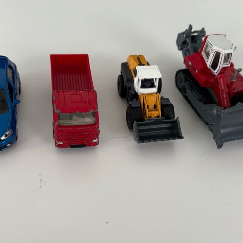Siku 1:87 4 pieces like new, Scania truck, Liebherr 764, VW Golf