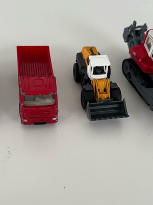 Siku 1:87 4 pieces like new, Scania truck, Liebherr 764, VW Golf