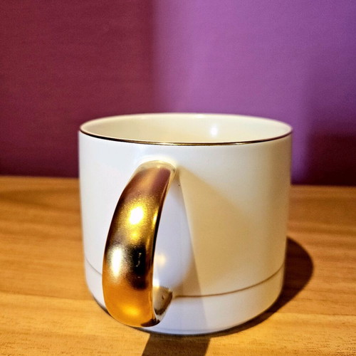 Cup like new with gold finish