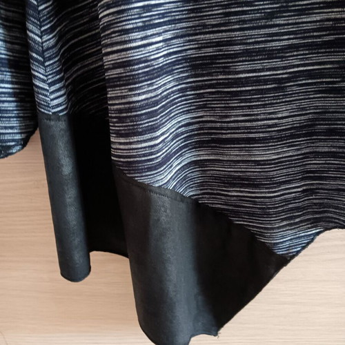 Women’s blouse like new, asymmetric with shoulder cutout, black and white