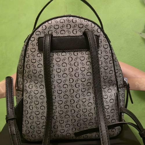 Guess women's backpack like new with gift pouch, black and gray