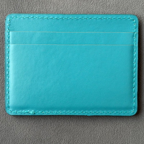 Hogan leather card holder like new, turquoise