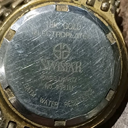 Swistar watch 18k gold plated used with visible signs of wear