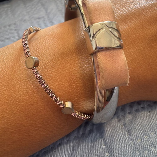 Bracelets pack of two, one collectible pink ribbon, used