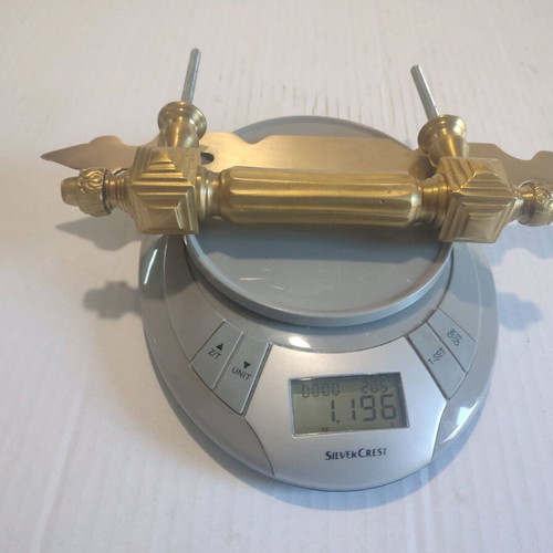 Door handle used, ornate solid brass