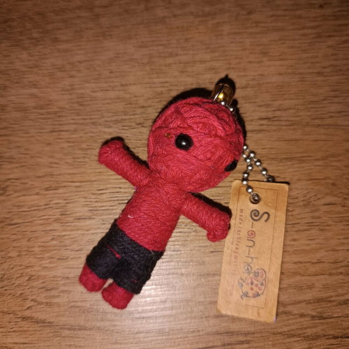 Voodoo doll used with its tag