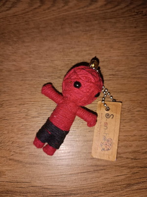 Voodoo doll used with its tag