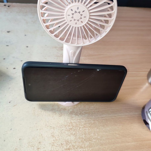 Mini fan with USB charging and phone holder, pink, new