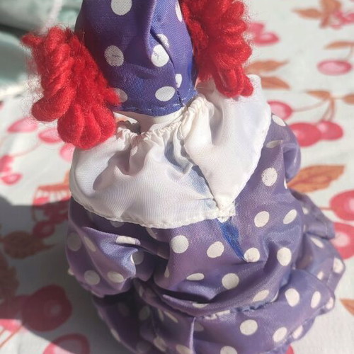 Vintage porcelain clown doll used