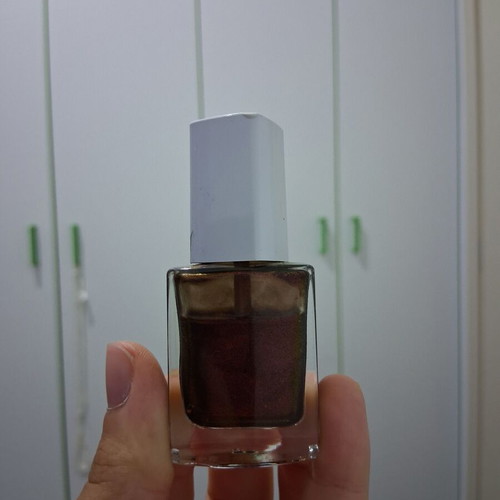 Brown shiny nail polish used