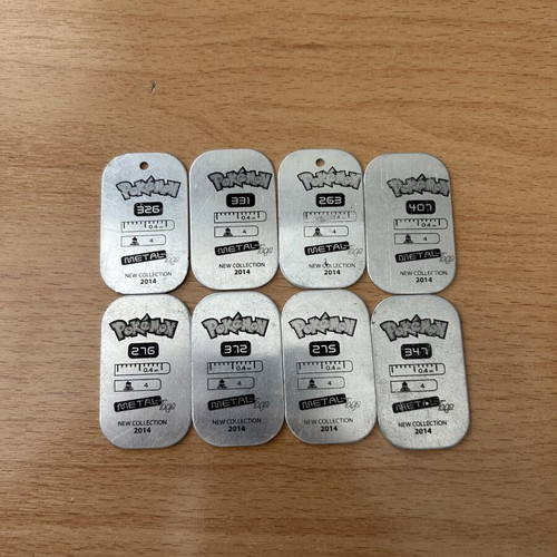 Pokemon Metal Tags set of 8 used, New Collection 2014