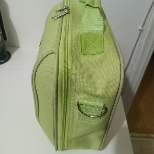 Travel toiletry bag used, green color, spacious