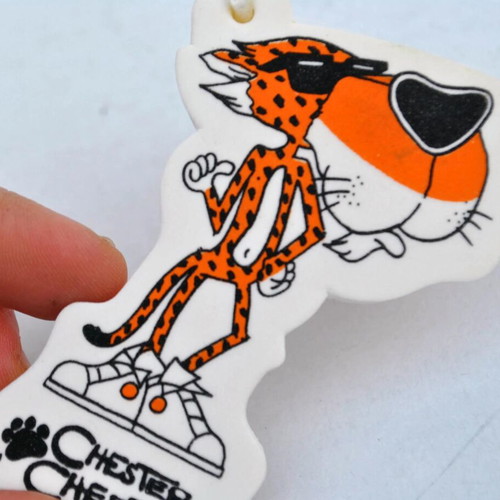 Chester Cheetah key chain holder like new, white and orange
