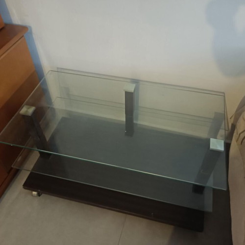 Glass coffee table with wheels used