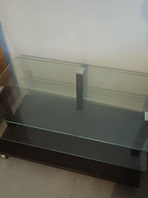 Glass coffee table with wheels used