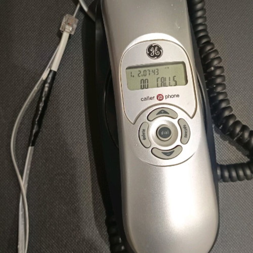 Wired landline phone like new, black, branded