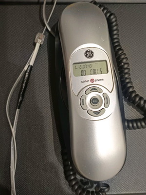 Wired landline phone like new, black, branded