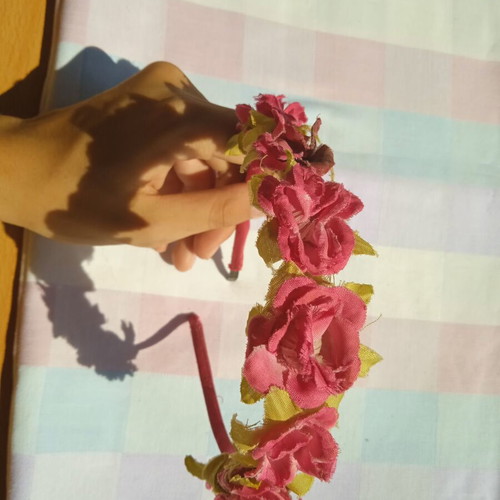 Children's tiara used with pink and green roses