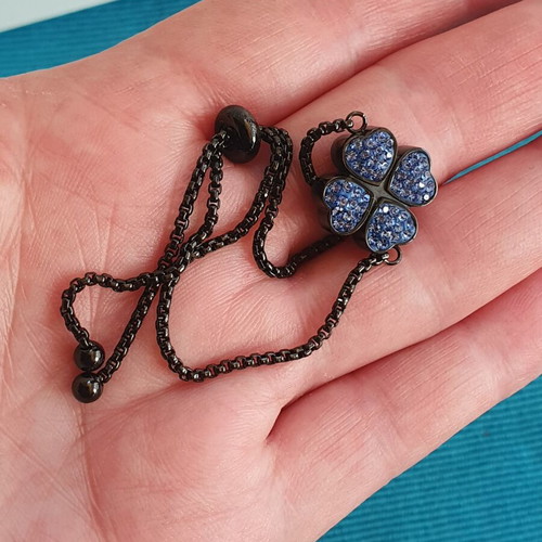 Folli Follie bracelet like new, black with blue crystals, adjustable