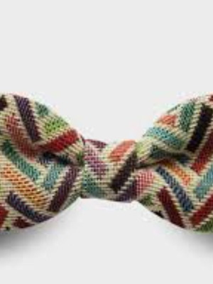 Children's bow tie unused in its packaging