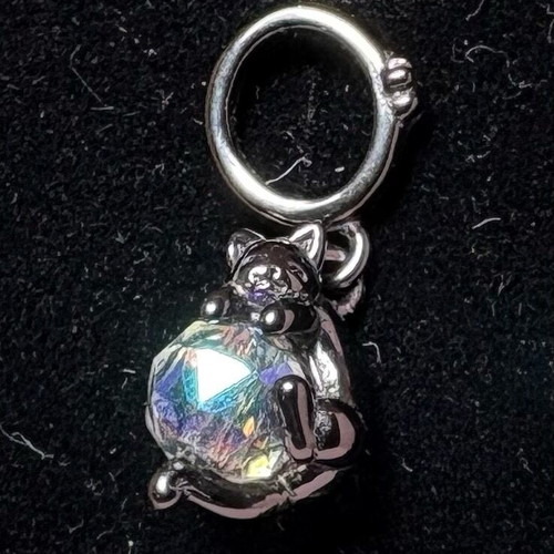 Cat charm like new with iridescent gemstone