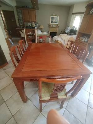 Rosewood dining table set like new with 8 chairs and extensions