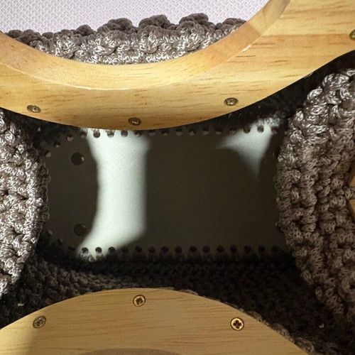 Handmade knitted beige bag with wooden magnetic clasp and beaded handle