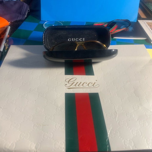 Gucci sunglasses like new, gold-colored acetate frame with case and bag