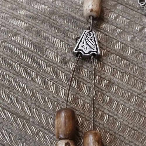 Worry beads made of bone used with oriental elements