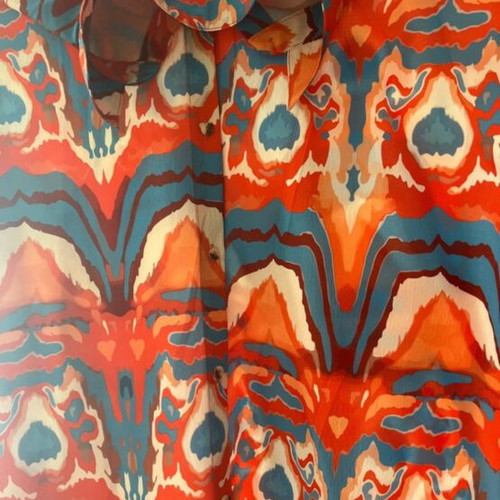 Women's shirt like new with blue, orange and white details, size large - extra large
