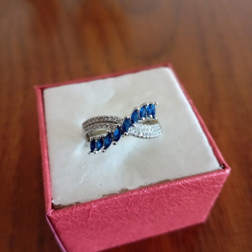 Ring new, gold plated with blue and silver zircon stones, size 7