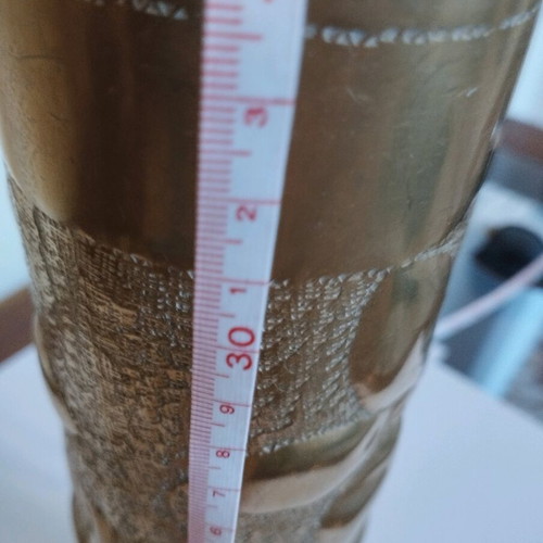 Bronze carved shell casing like new