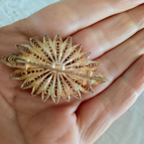 Vintage filigree sun brooch with pearls used