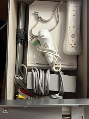 Nintendo Wii console with cables and one controller